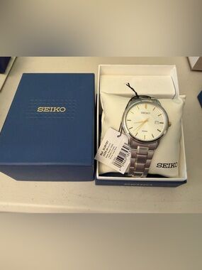 New Seiko SUR197 Neo Classic Two Tone Silver Dial 41 mm Date Quartz Men’s Watch